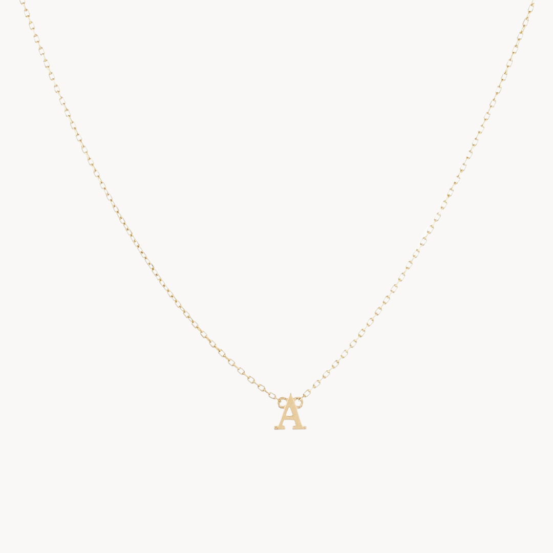Solid gold initial pendant on sale