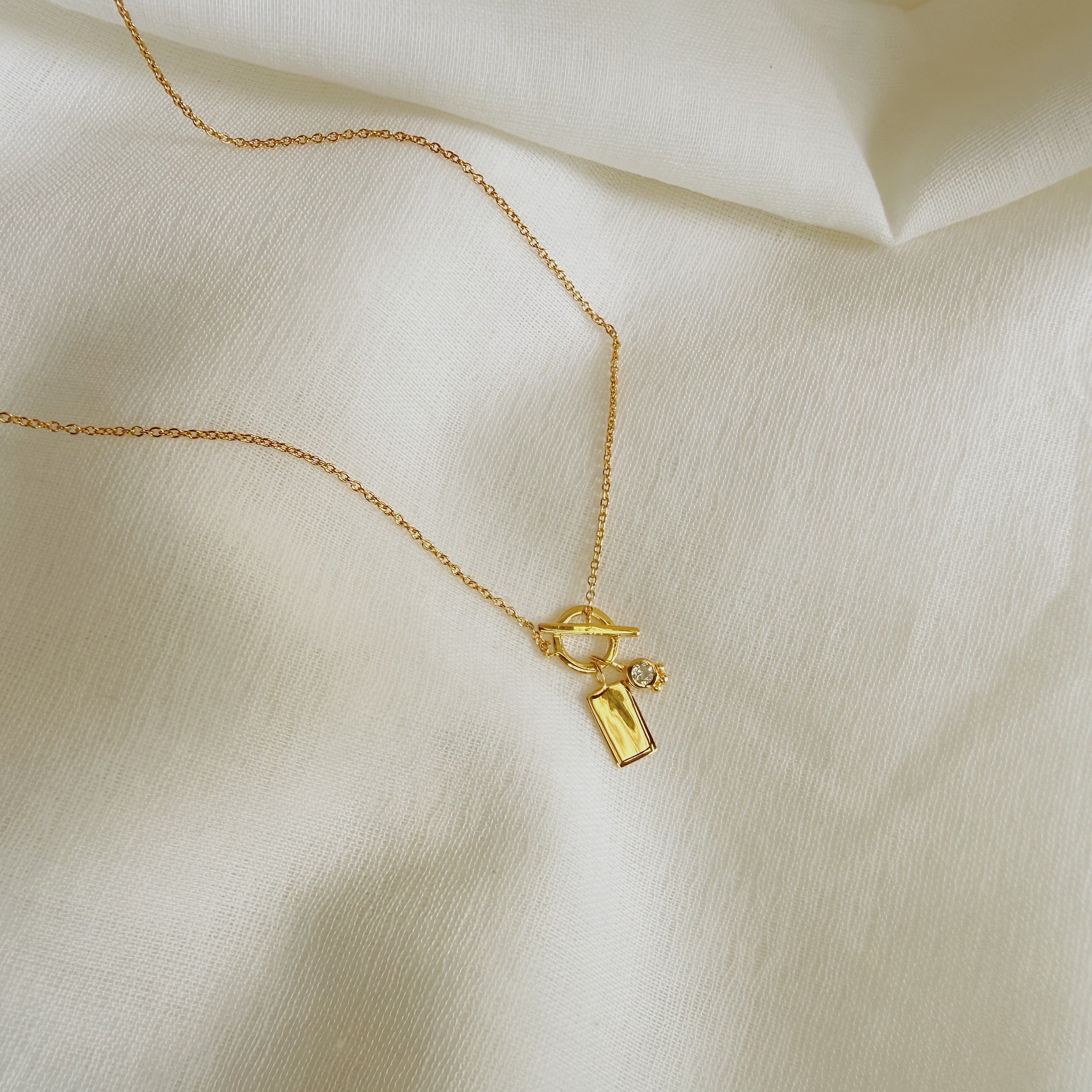 Interstellar Gold Charm Necklace